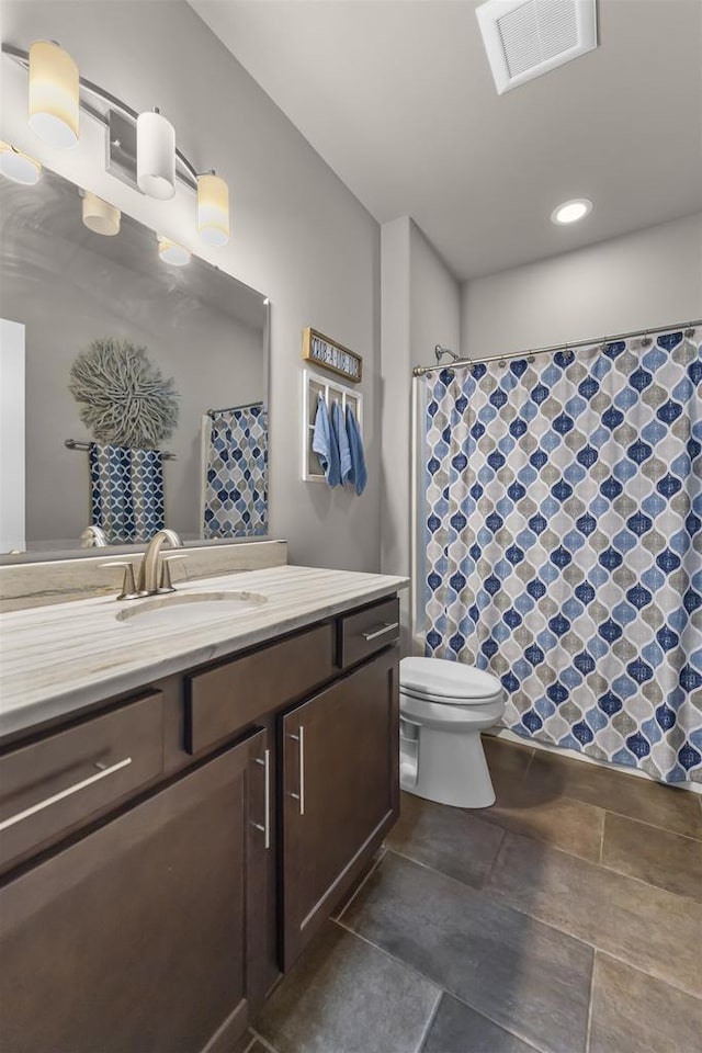 301 Church St, Barneveld, WI 53507 - bathroom with visible vents, toilet, vanity, and a shower with shower curtain