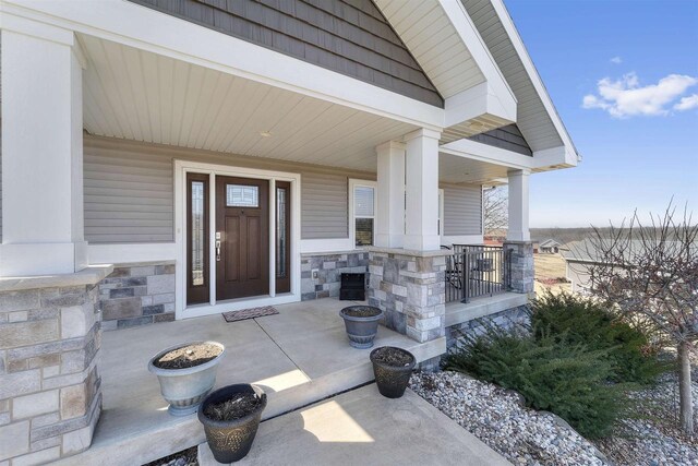 301 Church St, Barneveld, WI 53507 - doorway to property featuring covered porch