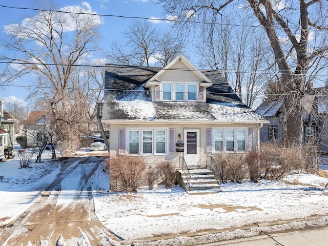 view of front of home featuring a balcony and driveway