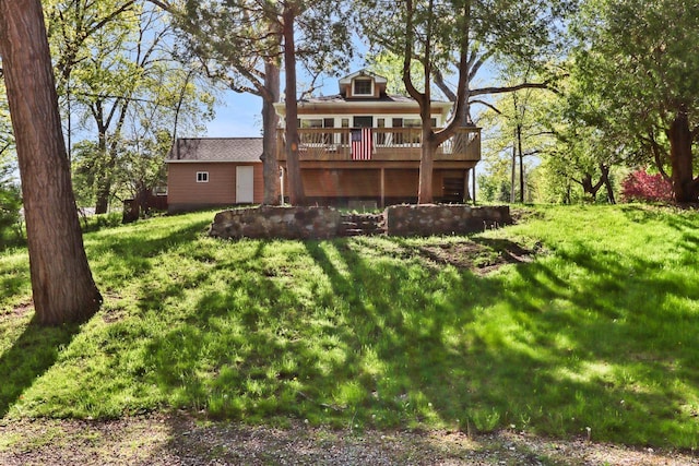 44 Oakwood St, Williams Bay, WI 53191 - back of property with a wooden deck and a lawn
