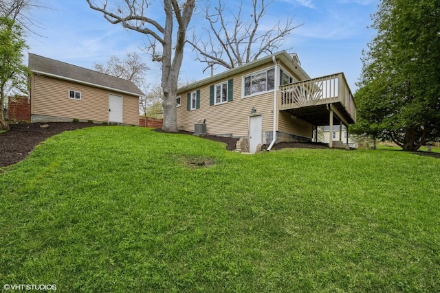 44 Oakwood St, Williams Bay, WI 53191 - back of property with a wooden deck, cooling unit, and a yard