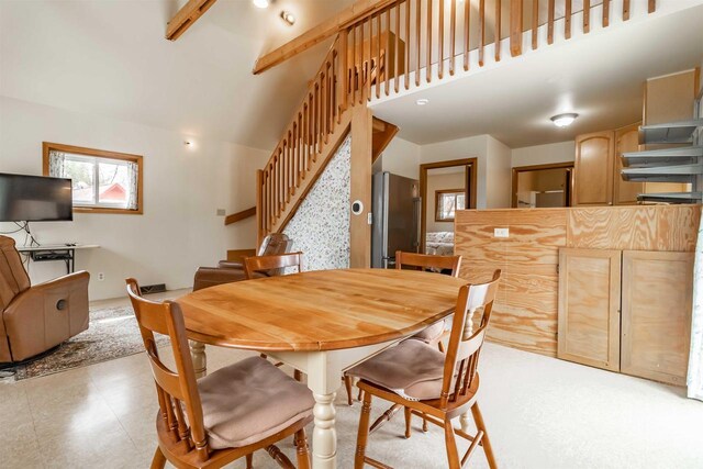 1735 W 19th Ave, Arkdale, WI 54613 - dining area featuring stairway and a high ceiling