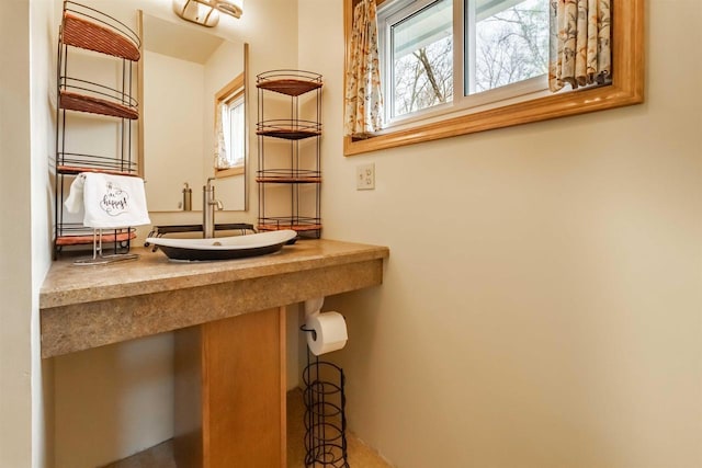 1735 W 19th Ave, Arkdale, WI 54613 - bathroom featuring a sink and plenty of natural light