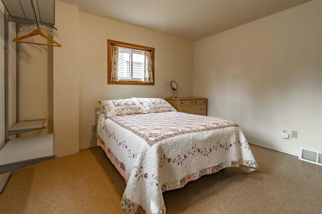 1735 W 19th Ave, Arkdale, WI 54613 - carpeted bedroom with visible vents