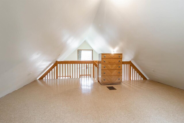 1735 W 19th Ave, Arkdale, WI 54613 - additional living space featuring vaulted ceiling