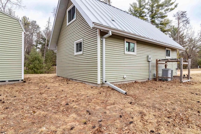 1735 W 19th Ave, Arkdale, WI 54613 - view of home's exterior featuring metal roof