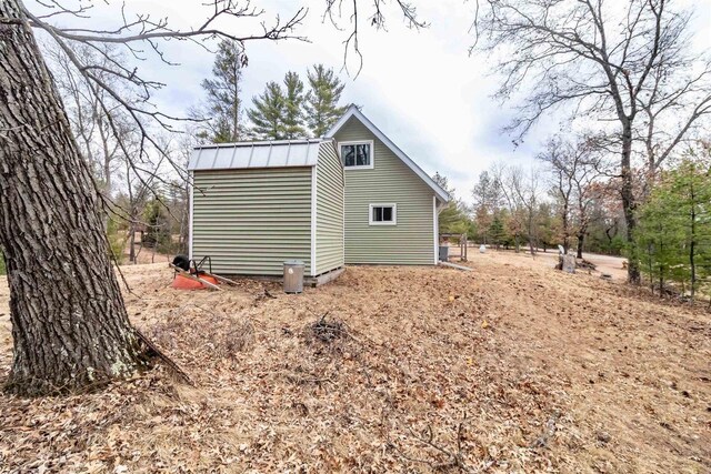 1735 W 19th Ave, Arkdale, WI 54613 - rear view of property featuring a standing seam roof and metal roof