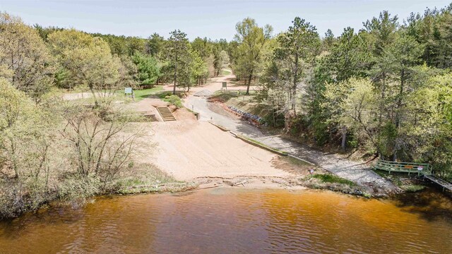 1735 W 19th Ave, Arkdale, WI 54613 - birds eye view of property featuring a wooded view and a water view