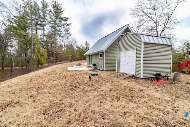 1735 W 19th Ave, Arkdale, WI 54613 - view of side of property with metal roof