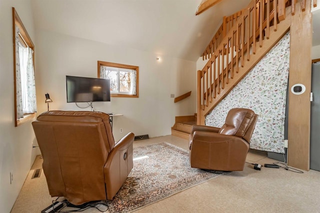 1735 W 19th Ave, Arkdale, WI 54613 - living room featuring visible vents, stairs, and vaulted ceiling