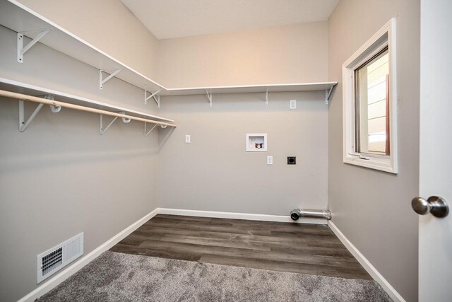 458 High Forest St, Winona, MN 55987 - clothes washing area with baseboards, visible vents, laundry area, electric dryer hookup, and washer hookup