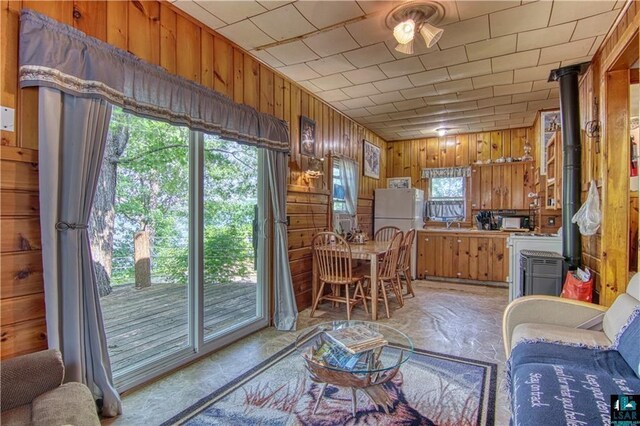 9293 N County Hwy E, Hayward, WI 54843 - interior space with wooden walls and a healthy amount of sunlight