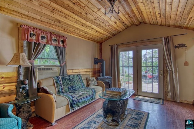 9293 N County Hwy E, Hayward, WI 54843 - living area featuring cooling unit, a wood stove, hardwood / wood-style flooring, vaulted ceiling, and wooden ceiling