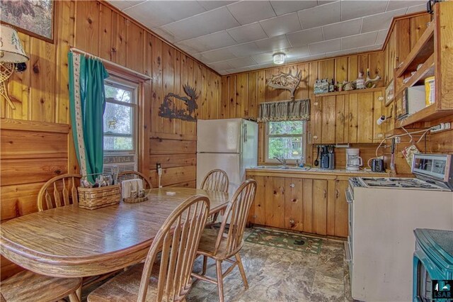 9293 N County Hwy E, Hayward, WI 54843 - dining room with wooden walls