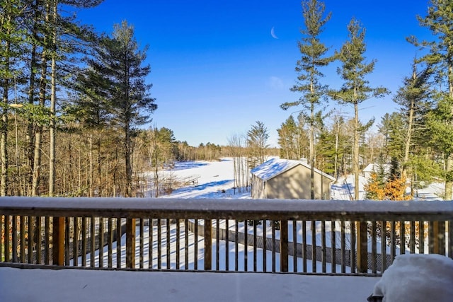 1055 Shishebogama Dr, Minocqua, WI 54548 - view of snow covered deck