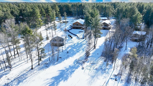 1055 Shishebogama Dr, Minocqua, WI 54548 - snowy aerial view with a view of trees