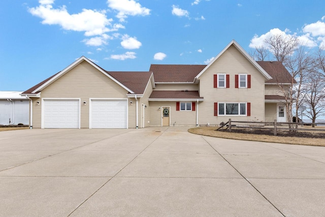 2721 Powder Hill Rd, Slinger, WI 53086 - traditional-style house featuring an attached garage, driveway, and fence