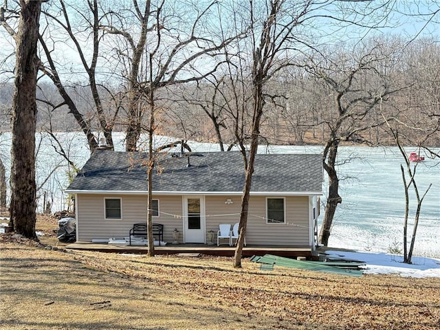 2897 Indian Mound Rd, Luck, WI 54853 - view of front of property featuring a wooden deck and roof with shingles