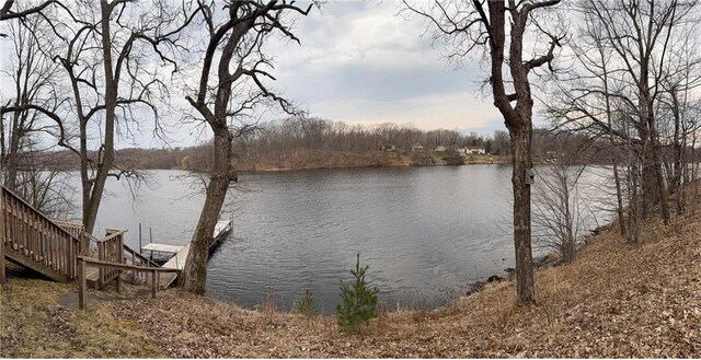 2897 Indian Mound Rd, Luck, WI 54853 - water view featuring stairs and a boat dock