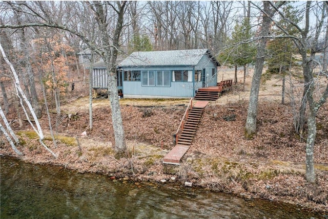 1741A S Deer Lake Cir, Saint Croix Falls, WI 54024 - view of yard featuring stairs and a deck with water view