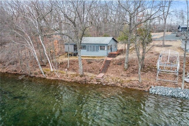 1741A S Deer Lake Cir, Saint Croix Falls, WI 54024 - back of house featuring a water view and stairway