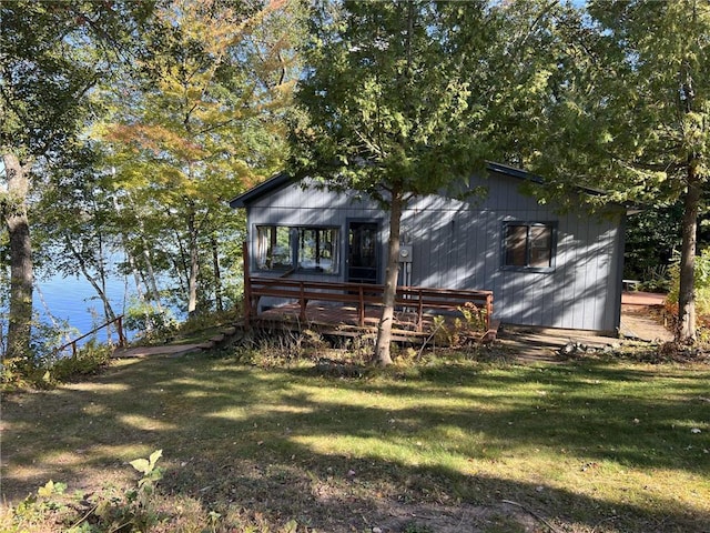1741A S Deer Lake Cir, Saint Croix Falls, WI 54024 - rear view of house featuring a yard and a deck