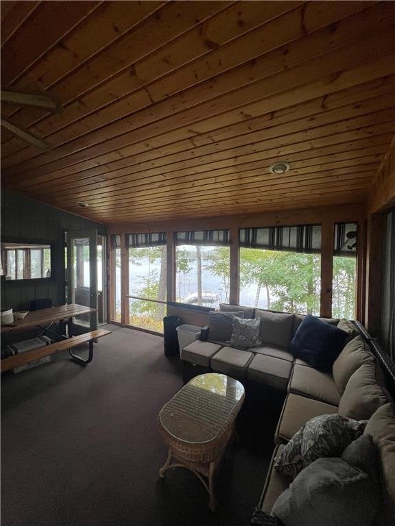 1741A S Deer Lake Cir, Saint Croix Falls, WI 54024 - carpeted living area featuring wood ceiling and vaulted ceiling
