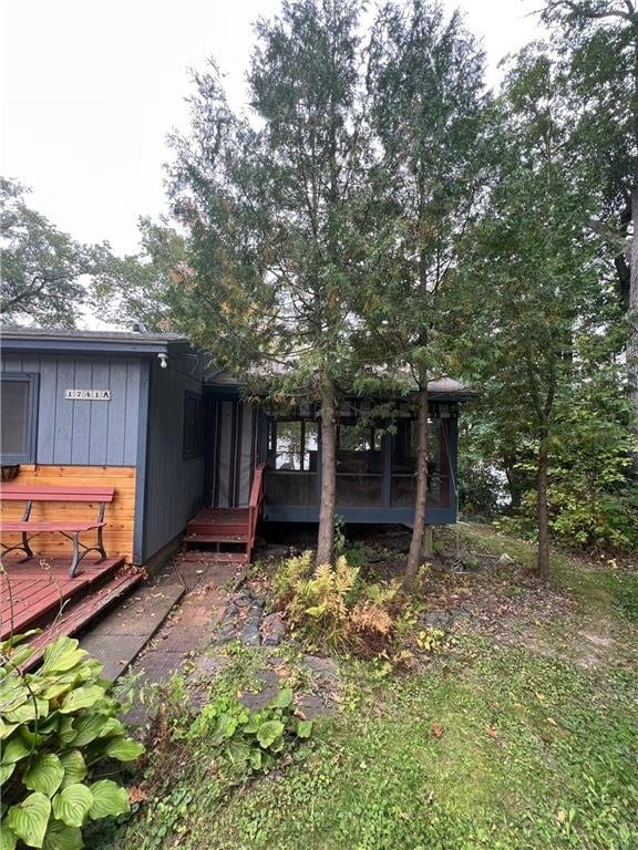 1741A S Deer Lake Cir, Saint Croix Falls, WI 54024 - view of yard featuring a sunroom