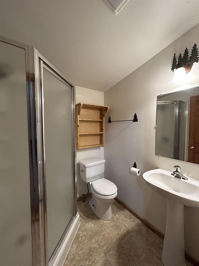 615 Sandy Beach Ct, Warrens, Warrens, WI 54666 - full bathroom with a shower stall, toilet, baseboards, and a sink