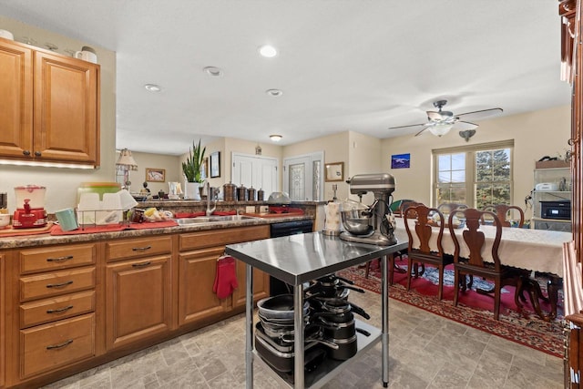 4229 W Howard Ave, Milwaukee, WI 53221 - kitchen featuring a ceiling fan, a peninsula, recessed lighting, a sink, and brown cabinets