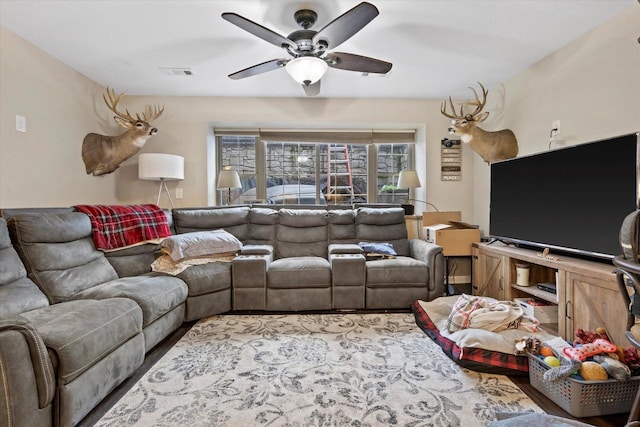 4229 W Howard Ave, Milwaukee, WI 53221 - living room featuring visible vents and a ceiling fan