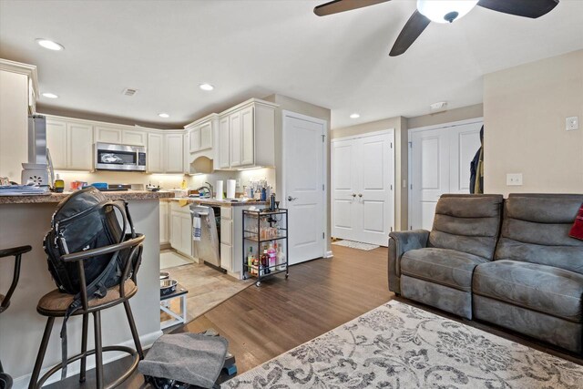 4229 W Howard Ave, Milwaukee, WI 53221 - living area featuring recessed lighting, light wood-style floors, and ceiling fan