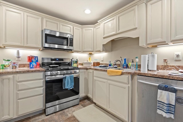 4229 W Howard Ave, Milwaukee, WI 53221 - kitchen featuring stone finish floor, recessed lighting, appliances with stainless steel finishes, and a sink