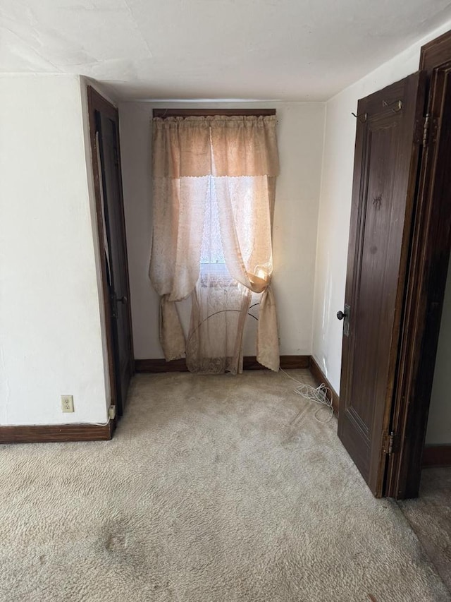 7126 W Congress St, Milwaukee, WI 53218 - unfurnished bedroom featuring baseboards and light carpet