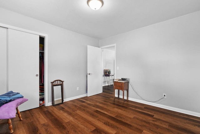 1-3 Mechanic St, Edgerton, WI 53534 - bedroom with baseboards, wood finished floors, and a closet