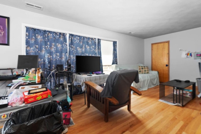 1-3 Mechanic St, Edgerton, WI 53534 - living room with wood finished floors and visible vents
