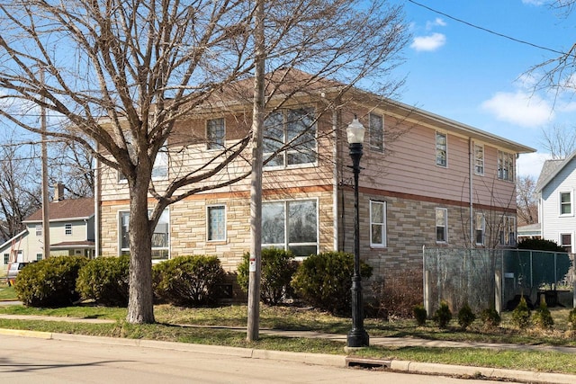 1-3 Mechanic St, Edgerton, WI 53534 - view of home's exterior featuring stone siding