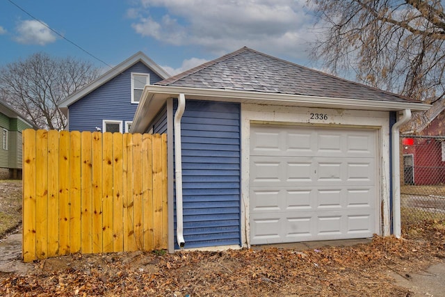 garage featuring fence