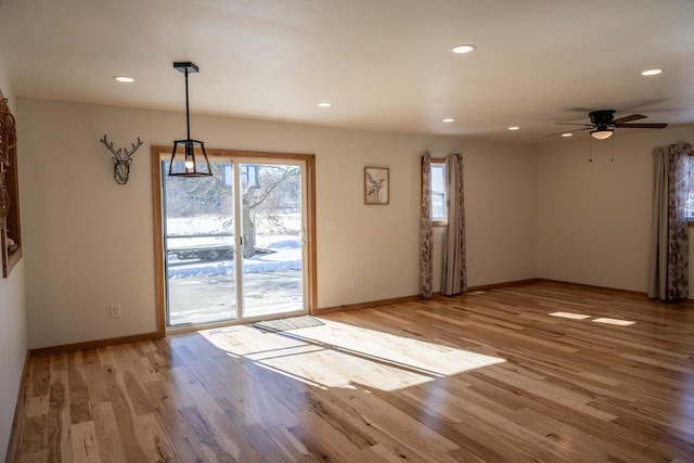 N2547 County Road G, Mauston, WI 53948 - unfurnished dining area featuring light wood-style flooring, a wealth of natural light, and recessed lighting