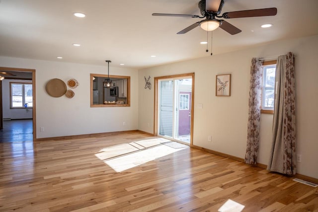 N2547 County Road G, Mauston, WI 53948 - interior space with visible vents, ceiling fan, recessed lighting, and light wood finished floors