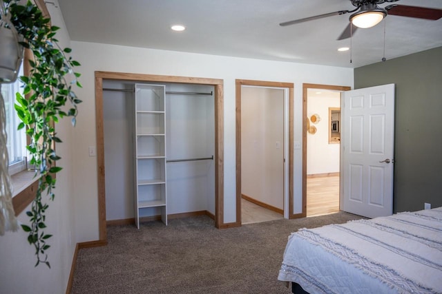 N2547 County Road G, Mauston, WI 53948 - bedroom with baseboards, recessed lighting, a ceiling fan, carpet floors, and multiple closets