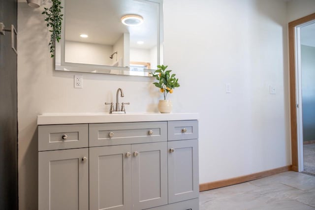 N2547 County Road G, Mauston, WI 53948 - bathroom featuring baseboards and vanity