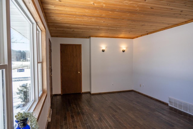 N2547 County Road G, Mauston, WI 53948 - empty room featuring visible vents, baseboards, wooden ceiling, dark wood-style flooring, and ornamental molding