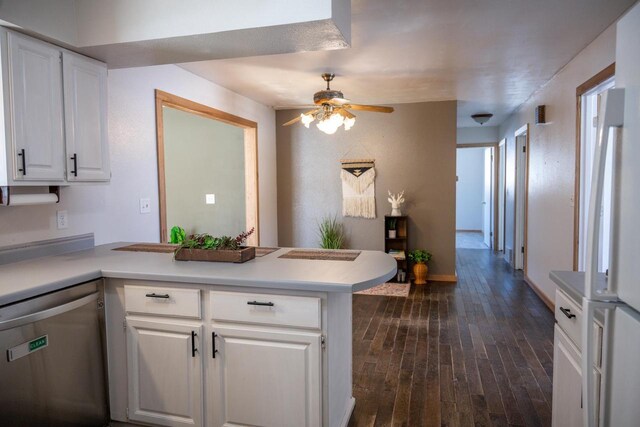 N2547 County Road G, Mauston, WI 53948 - kitchen featuring white cabinetry, stainless steel dishwasher, a ceiling fan, and a peninsula
