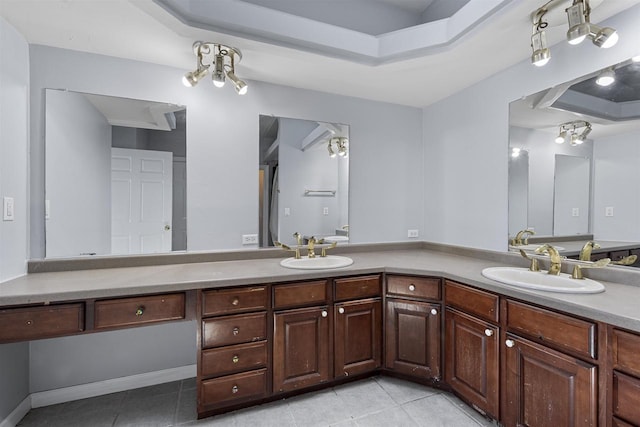 2155 Cottonwood Dr, Menasha, WI 54952 - bathroom featuring tile patterned floors, double vanity, and a sink