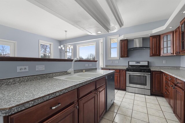 2155 Cottonwood Dr, Menasha, WI 54952 - kitchen with a healthy amount of sunlight, wall chimney range hood, a chandelier, appliances with stainless steel finishes, and a sink