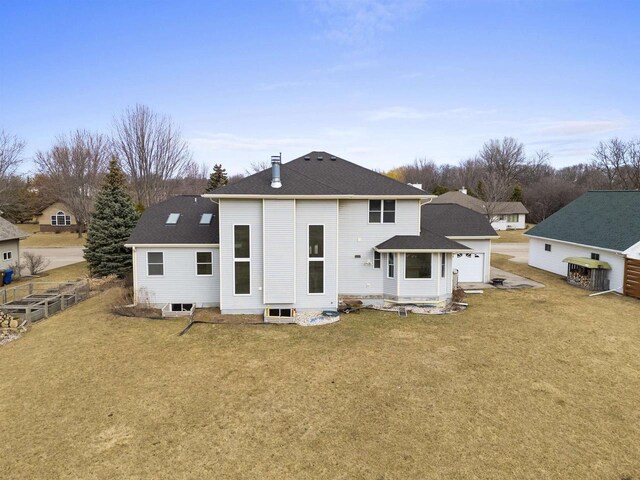2155 Cottonwood Dr, Menasha, WI 54952 - back of property with a lawn and roof with shingles