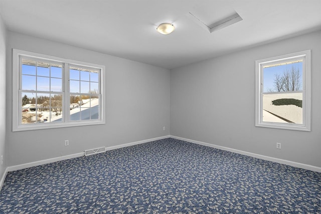 2155 Cottonwood Dr, Menasha, WI 54952 - carpeted spare room with attic access, baseboards, and visible vents