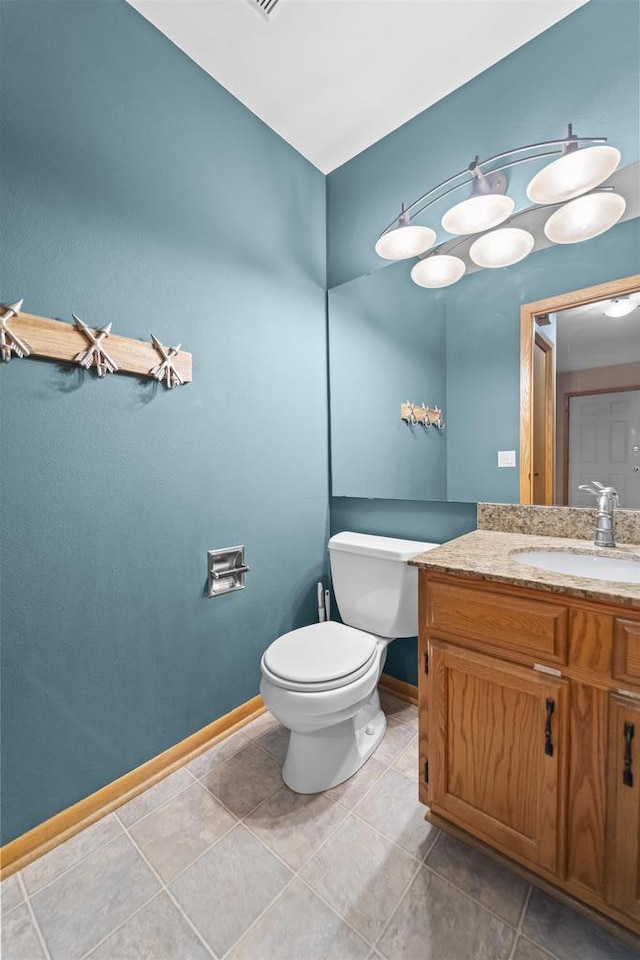 314 Castle Oaks Xing, Waunakee, WI 53597 - half bath with baseboards, vanity, and toilet