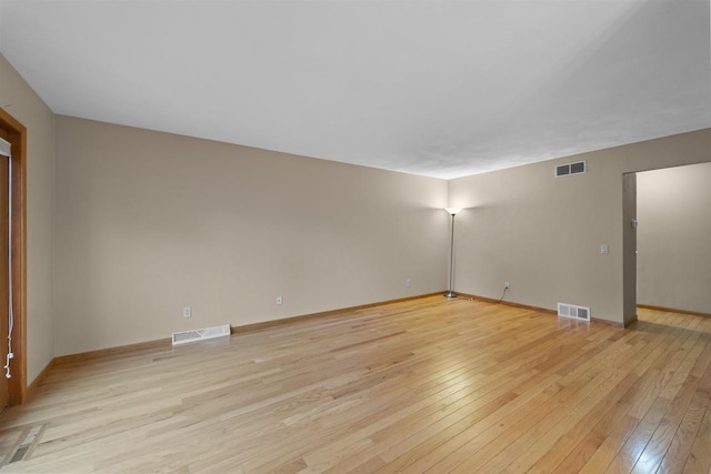 314 Castle Oaks Xing, Waunakee, WI 53597 - spare room with light wood-style floors and baseboards